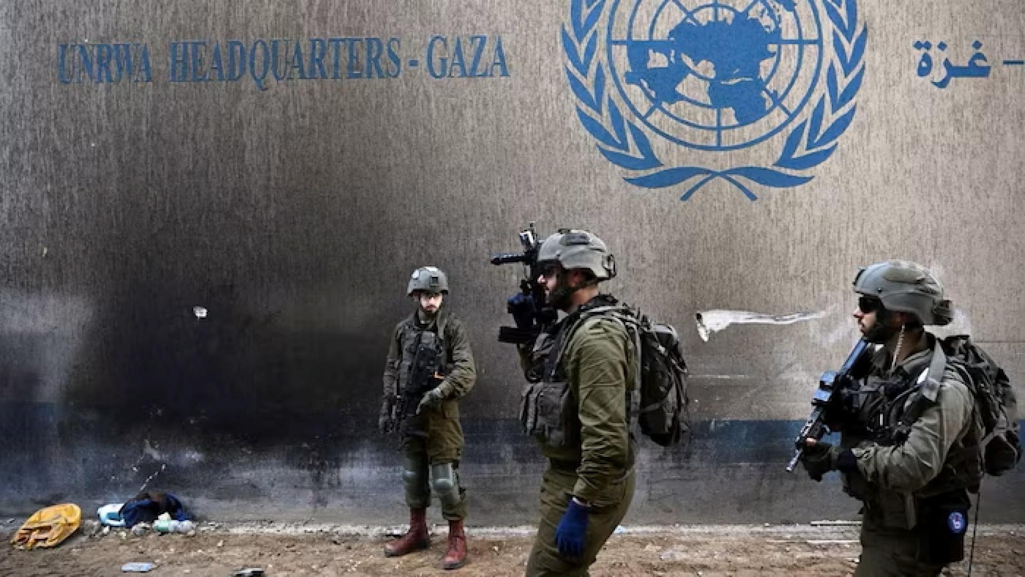 Photo of Israeli soldiers next to UNRWA Headquarters in Gaza