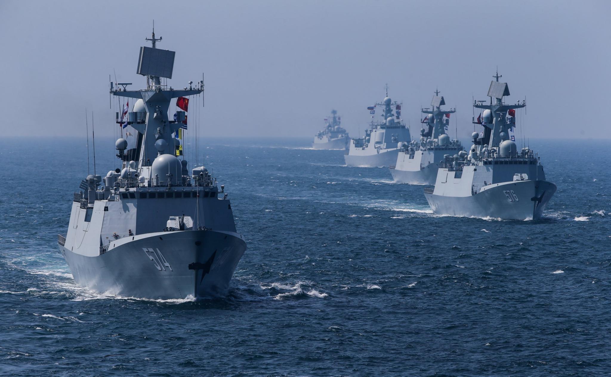 A fleet of ships sail out at sea as China and Russia's naval joint drill concludes in Zhanjiang, Guangdong Province, China, September 19, 2016. 