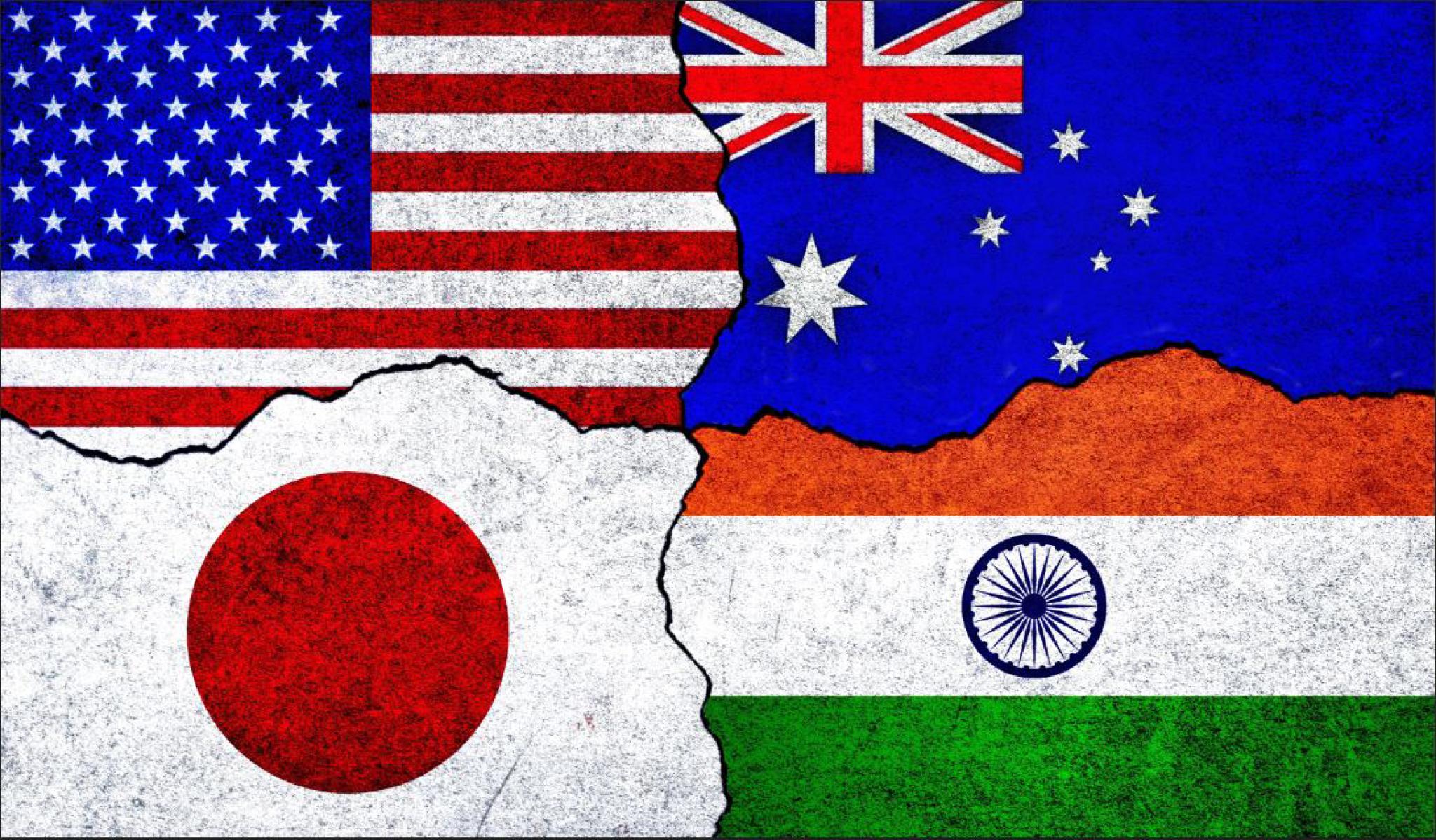 Quad members USA, Japan, India and Australia flags together. Quadrilateral Security Dialogue members. 