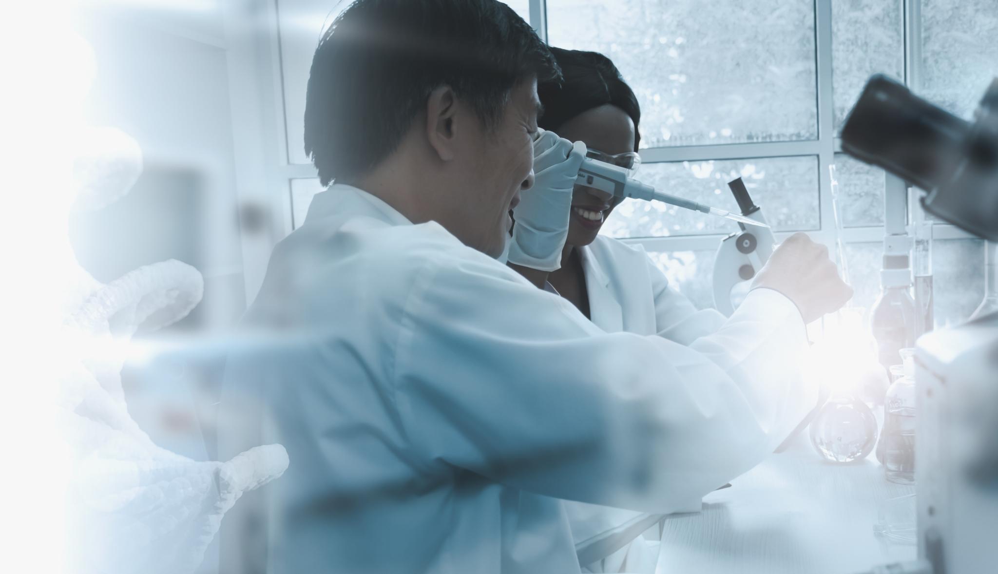 Scientists using a light in a lab