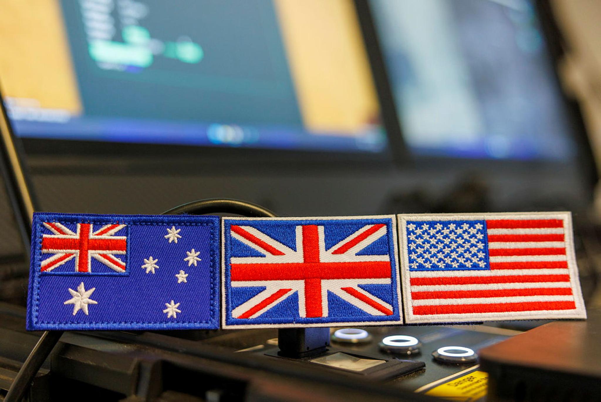 Image of AUKUS countries (Australian, United Kingdom and American) TRF (Tactical Recognition Flash) on display