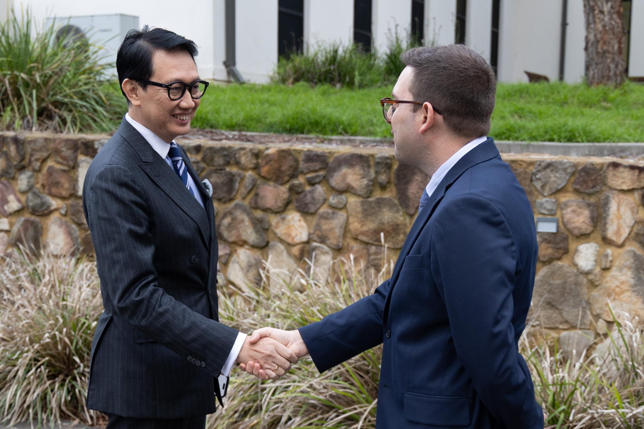 James Pitman with an Indonesian visitor