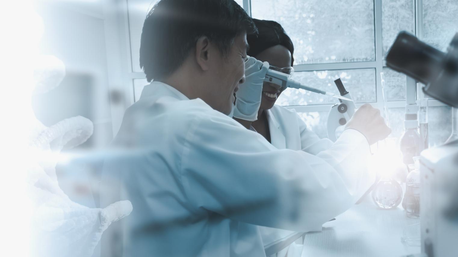 Scientists using a light in a lab