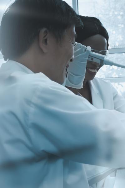 Scientists using a light in a lab